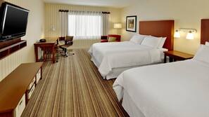 Hypo-allergenic bedding, down comforters, pillowtop beds, in-room safe