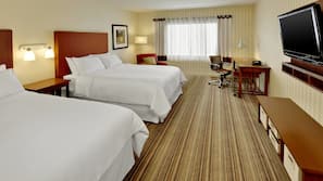 Hypo-allergenic bedding, down comforters, pillowtop beds, in-room safe