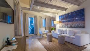 Premium bedding, down comforters, minibar, in-room safe