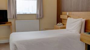Premium bedding, desk, laptop workspace, iron/ironing board