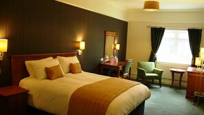 Premium bedding, desk, laptop workspace, iron/ironing board