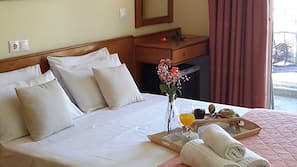 Coffre-forts dans les chambres, fer et planche à repasser sur demande