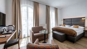 Luxe beddengoed, een minibar, een kluis op de kamer, een bureau