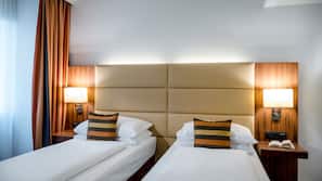 Luxe beddengoed, een minibar, een kluis op de kamer, een bureau