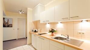 Fridge, microwave, hob, coffee/tea maker