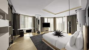 Lakens van Egyptisch katoen, pillowtop-bedden, een minibar