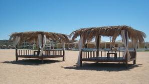 Private beach, sun loungers, beach umbrellas, beach towels