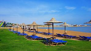 Private beach, sun loungers, beach umbrellas, beach towels