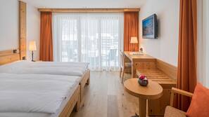 Couette en duvet d'oie, coffre-forts dans les chambres, bureau