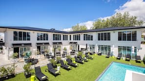 Outdoor pool, pool umbrellas, sun loungers