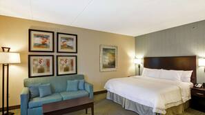 Premium bedding, desk, laptop workspace, blackout curtains
