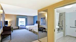 Premium bedding, desk, laptop workspace, blackout curtains