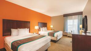 Premium bedding, desk, laptop workspace, iron/ironing board