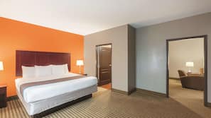 Premium bedding, desk, laptop workspace, iron/ironing board