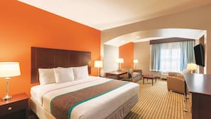 Premium bedding, desk, laptop workspace, iron/ironing board