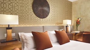 Premium bedding, down comforters, pillowtop beds, minibar
