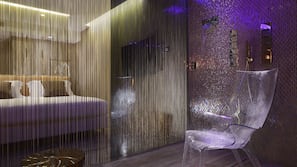 Premium bedding, down comforters, pillowtop beds, minibar