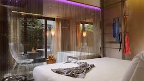 Premium bedding, down comforters, pillowtop beds, minibar