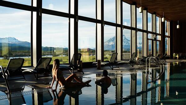 Indoor pool, open 9 AM to 9 PM, pool loungers