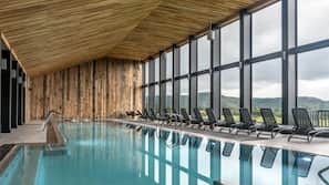 Indoor pool, open 9 AM to 9 PM, pool loungers