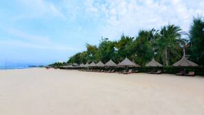 Private beach, white sand, sun loungers, beach umbrellas