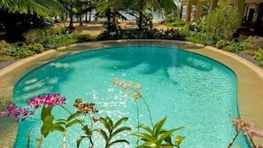 Outdoor pool, pool umbrellas, sun loungers