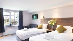Minibar, desk, laptop workspace, iron/ironing board