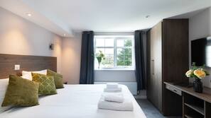 Minibar, desk, laptop workspace, iron/ironing board