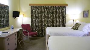 Premium bedding, pillowtop beds, desk, blackout drapes