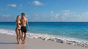 Private beach, white sand, sun loungers, beach towels