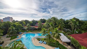 2 outdoor pools, open 9 AM to 9 PM, sun loungers