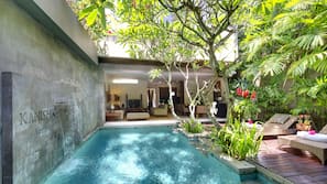 Outdoor pool, pool umbrellas, pool loungers