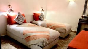 Ropa de cama de alta calidad, minibar, caja fuerte y escritorio