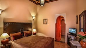 Ropa de cama de alta calidad, minibar, caja fuerte y escritorio