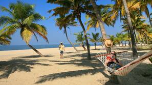 On the beach, beach towels, fishing