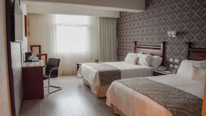 Premium bedding, down comforters, pillowtop beds, in-room safe
