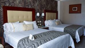 Premium bedding, down comforters, pillowtop beds, in-room safe
