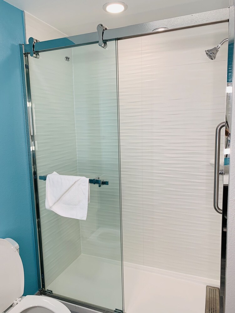 Bathroom shower, La Quinta Inn & Suites by Wyndham Montgomery