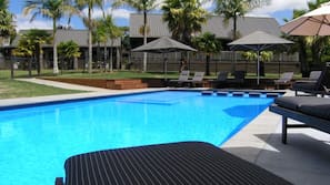 Outdoor pool, pool umbrellas, pool loungers