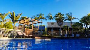 Outdoor pool, pool umbrellas, pool loungers