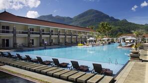 Outdoor pool, free cabanas, pool umbrellas