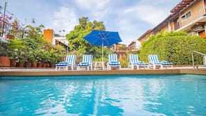 Outdoor pool, pool umbrellas, pool loungers