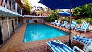 Outdoor pool, pool umbrellas, pool loungers