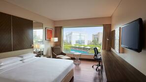 Premium bedding, pillow top beds, minibar, in-room safe
