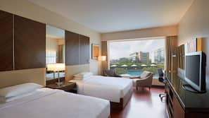 Premium bedding, pillow top beds, minibar, in-room safe