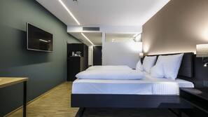 Hypoallergeen beddengoed, een minibar, een kluis op de kamer, een bureau
