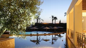 Indoor pool, outdoor pool, open 7:30 AM to 7:30 PM, pool umbrellas