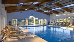 Indoor pool, outdoor pool, open 7:30 AM to 7:30 PM, pool umbrellas