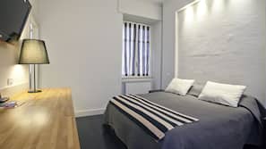 Down duvet, desk, iron/ironing board, free cots/infant beds