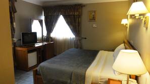 Premium bedding, down duvet, in-room safe, desk